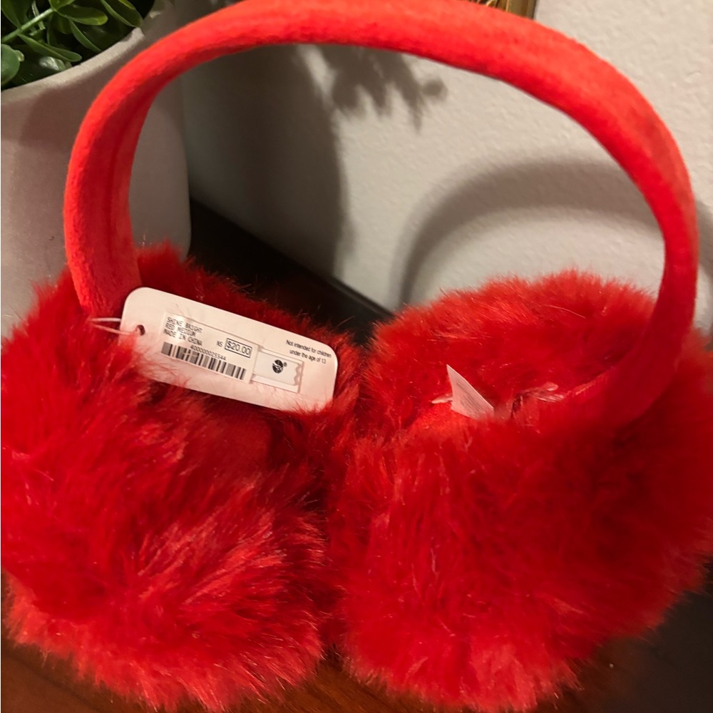 NWT Charming Charlie Red Earmuffs.
Charlie Brown=sold separately in my closet